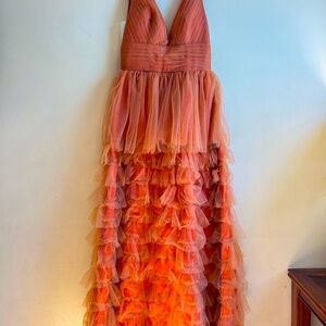 Orange ruffled dressed for any occasion.